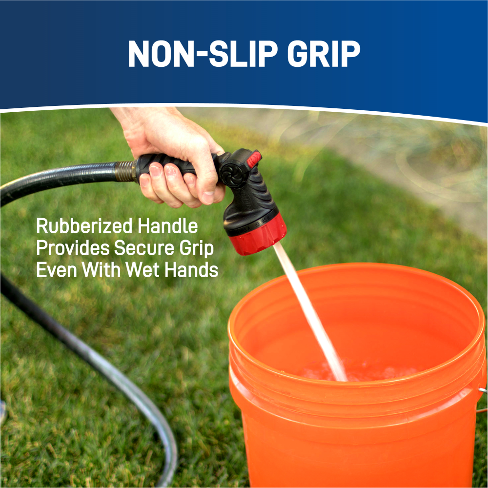 Spraying water in a bucket, showing how the rubberized non-slip grip provides secure handling with wet hands.