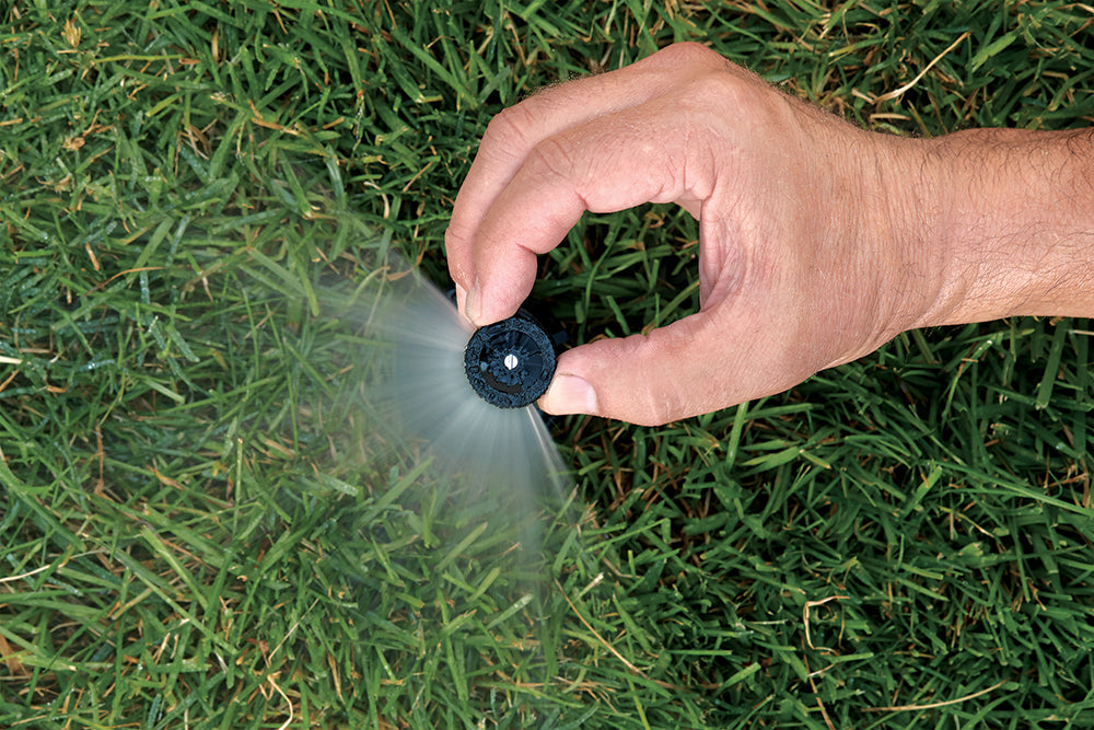 The adjustable pattern spray nozzle is engineered to deliver uniform droplet sizes across a 0 to 360 degree arc. It includes a filter and adjustment screw.