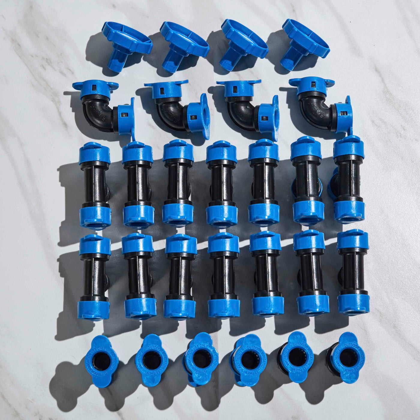 Blu-Lock push fittings. Four drain valves, four elbows, fourteen tees, four couplings and two hose faucet adapters.  